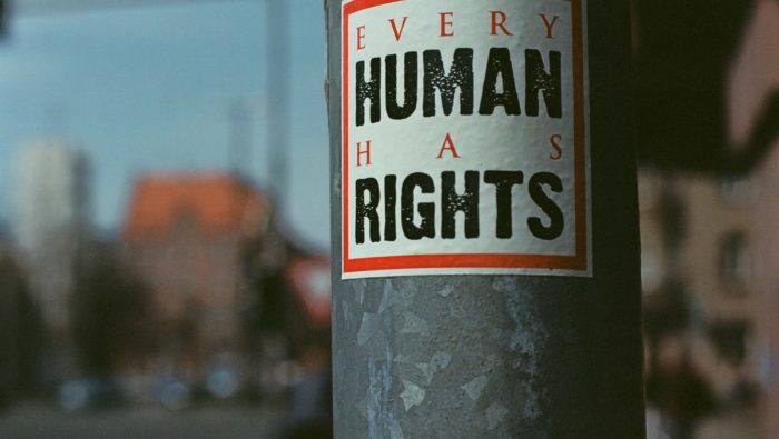 A sticker reads 'Every Human Has Rights'.
